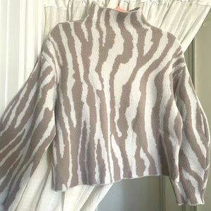 Express knit sweater in animal print